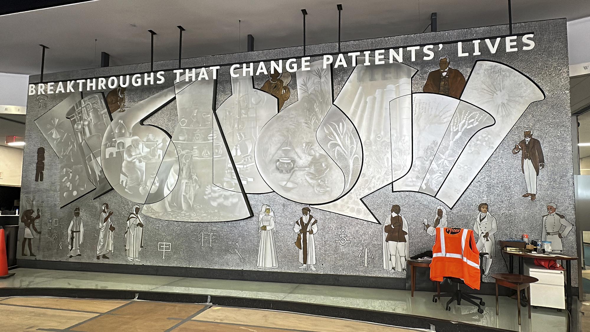 A mural honoring scientists hung in Pfizer’s NYC lobby for 60 years. Now it’s up for grabs