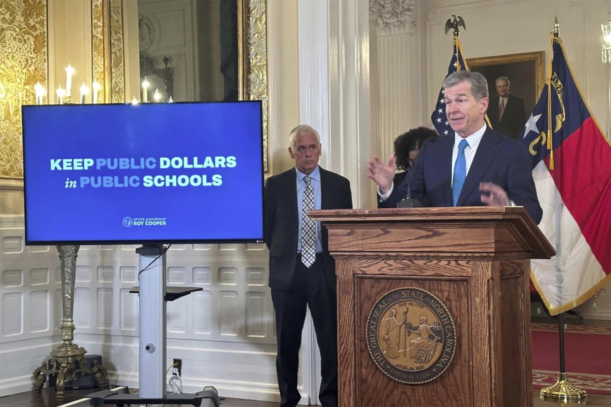 North Carolina’s governor vetoes private school vouchers and immigration enforcement orders