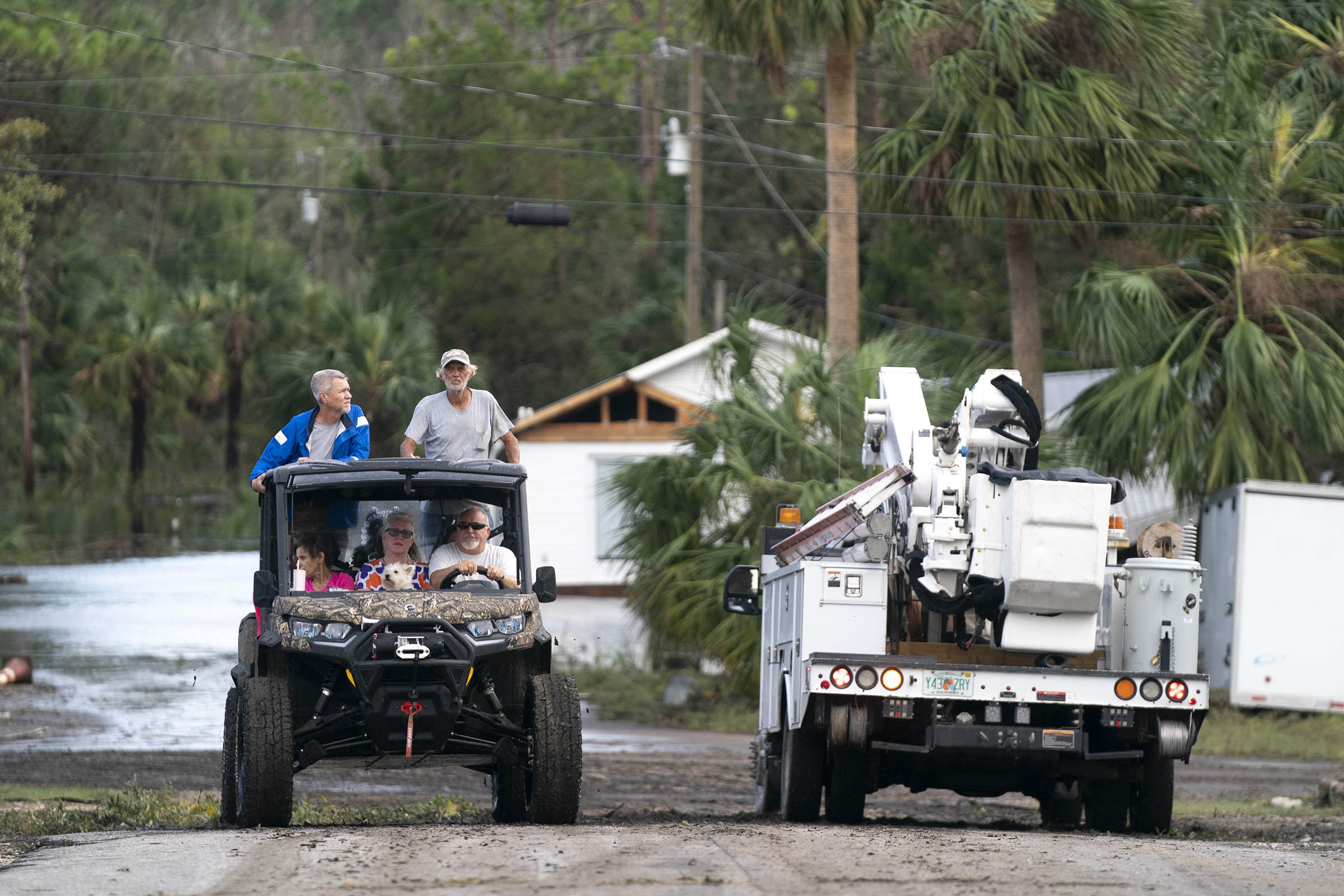 Rescuers save and assist hundreds as Helene’s storm surge and rain create havoc