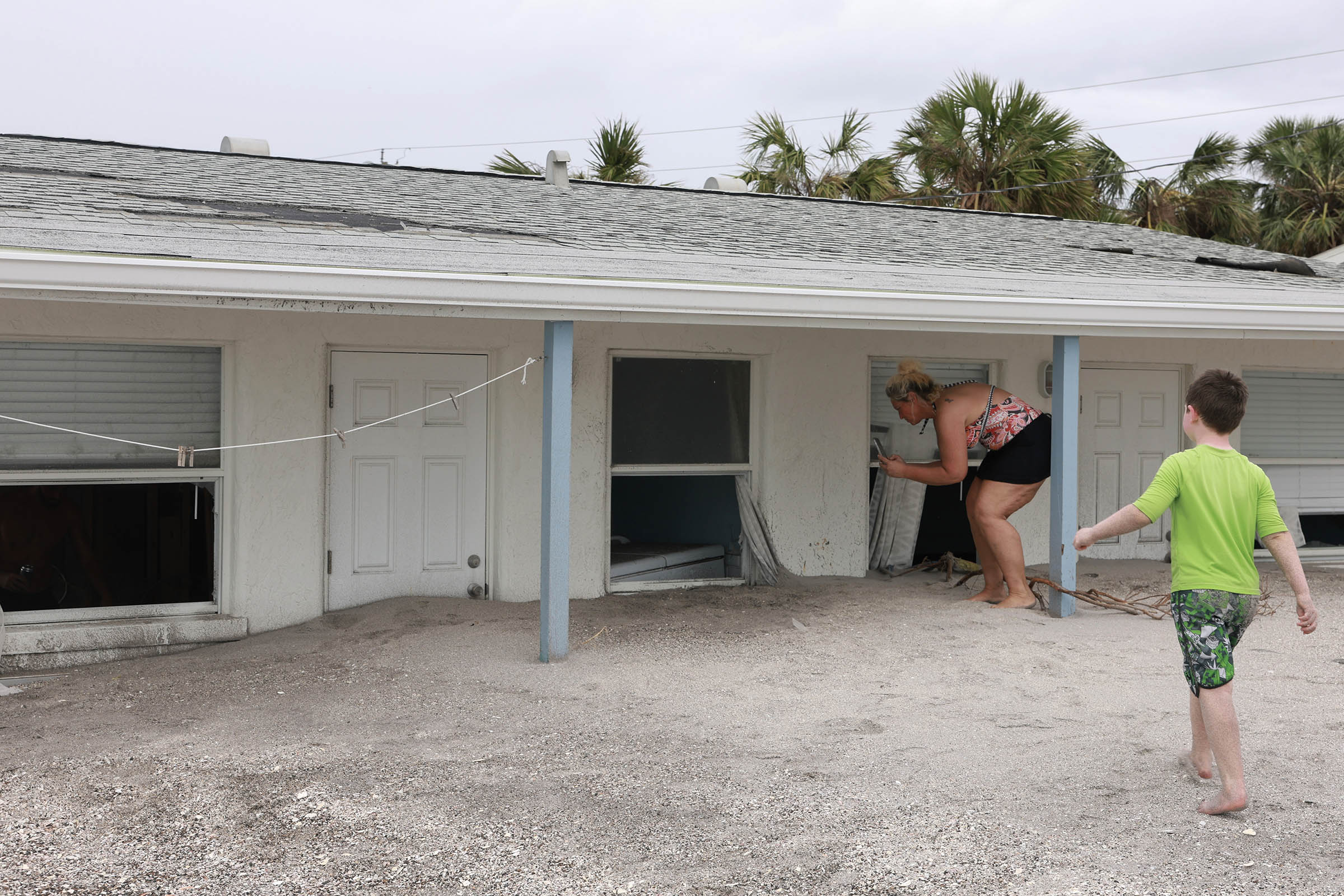 Residents repair their homes and clean up after Hurricane Milton tore through Florida