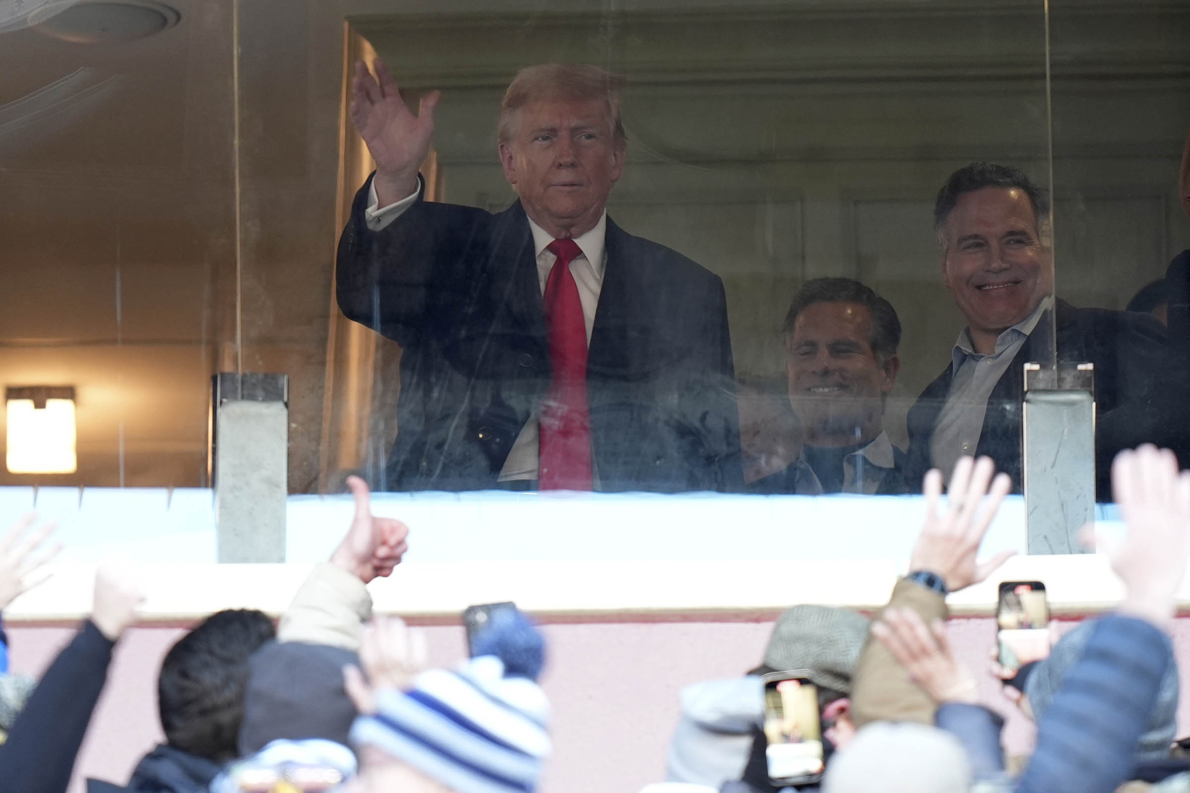 Trump gets warm welcome as he watches Army-Navy game alongside key allies, nominees and Daniel Penny